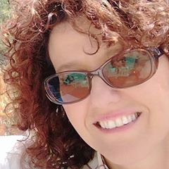 Immagine del profilo di Silvia Vinciguerra, L'immagine può contenere: 1 persona, con sorriso, occhiali_da_sole e primo piano
